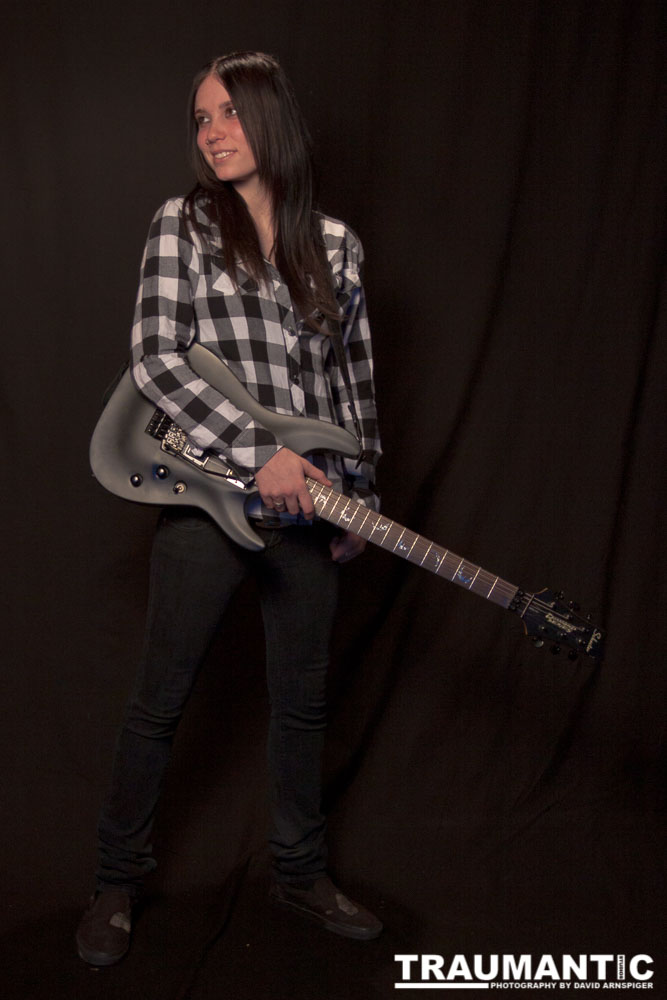 I saw an amazing picture on a web site of this female guitarist.  She was beautiful.  After a bit of searching, I was able to contact her and we did this shoot together.